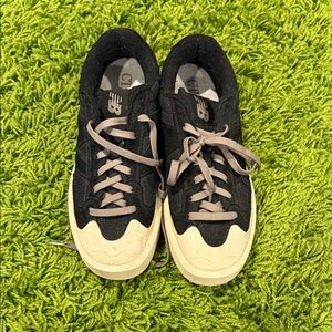 New Balance Black and Cream Sneakers